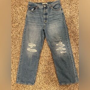 Levi's Relaxed Fit Blue Jeans with Distressed Details